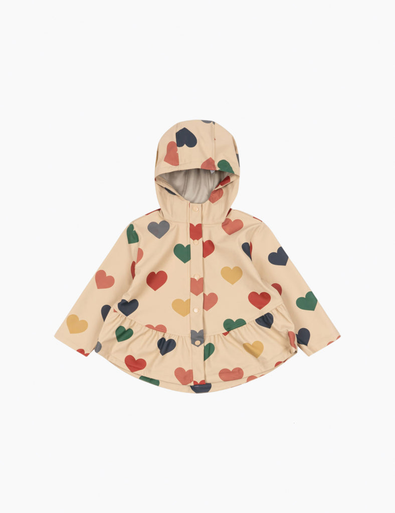 Children's raincoat with heart pattern on a white background