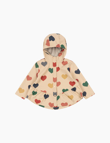 Children's raincoat with heart pattern on a white background