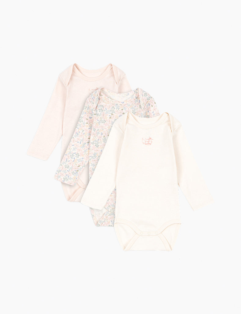 3-pack baby bodysuits on a white background.