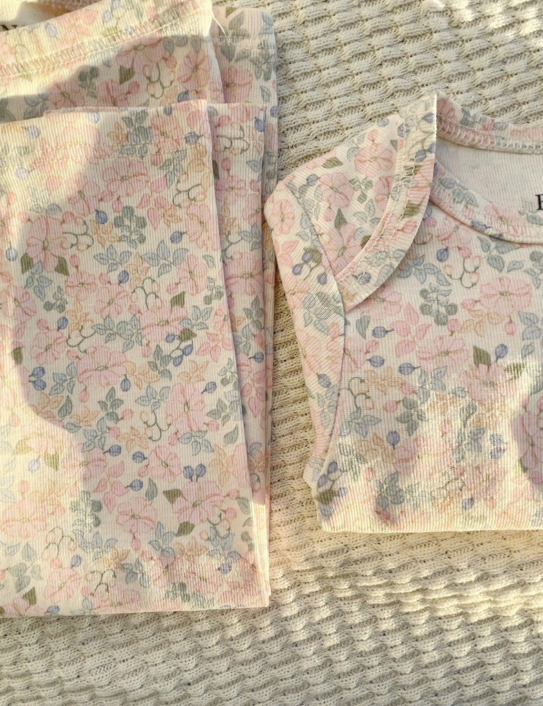 Floral-patterned envelopes on a textured surface