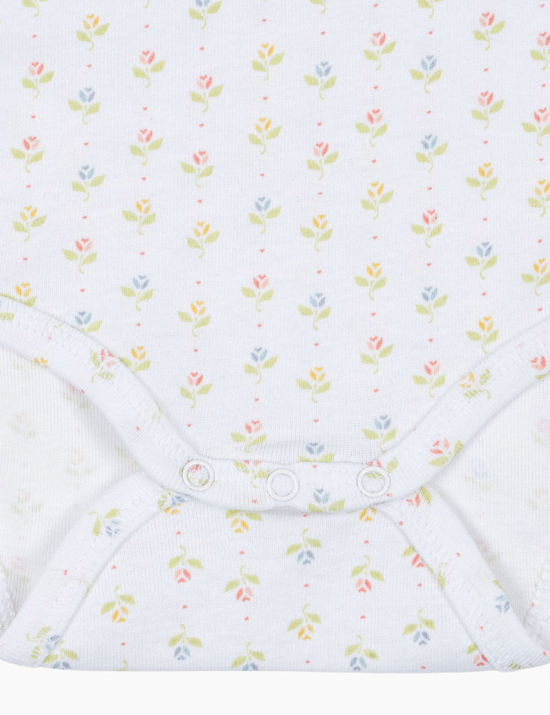 Floral patterned fabric with small flowers on a white background