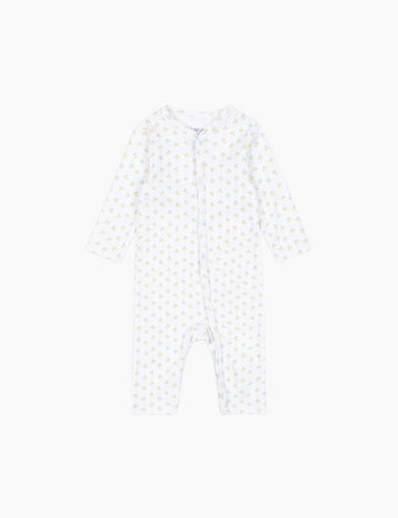 White baby onesie with small tulip patterns on a white background