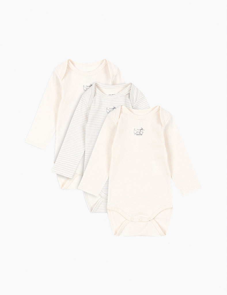 Three baby onesies on a white background