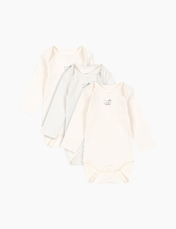 Three baby onesies on a white background