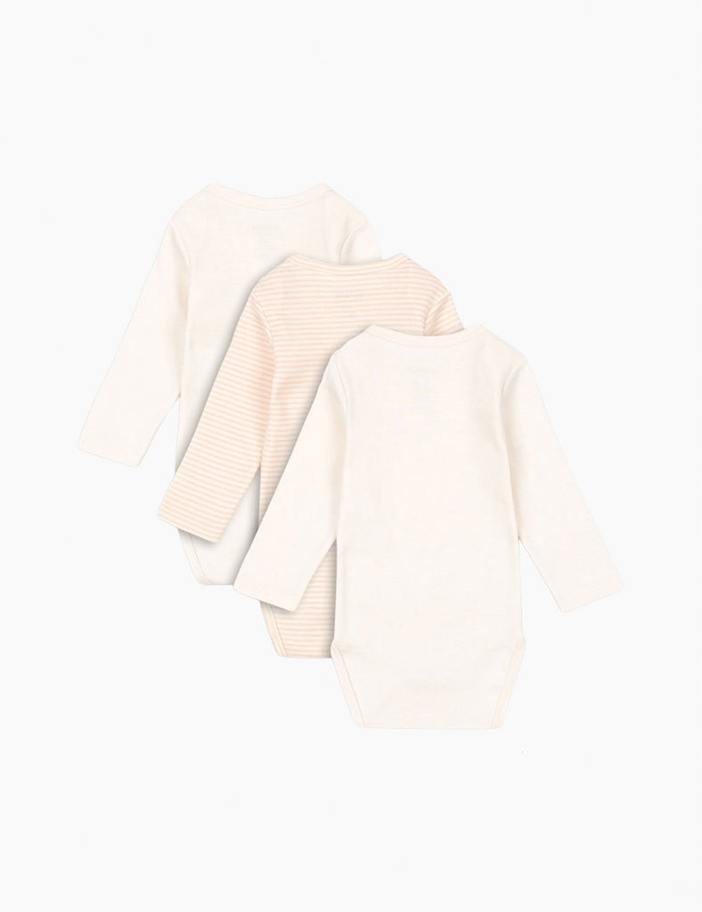 Light-colored fabric with a subtle pattern on a white background