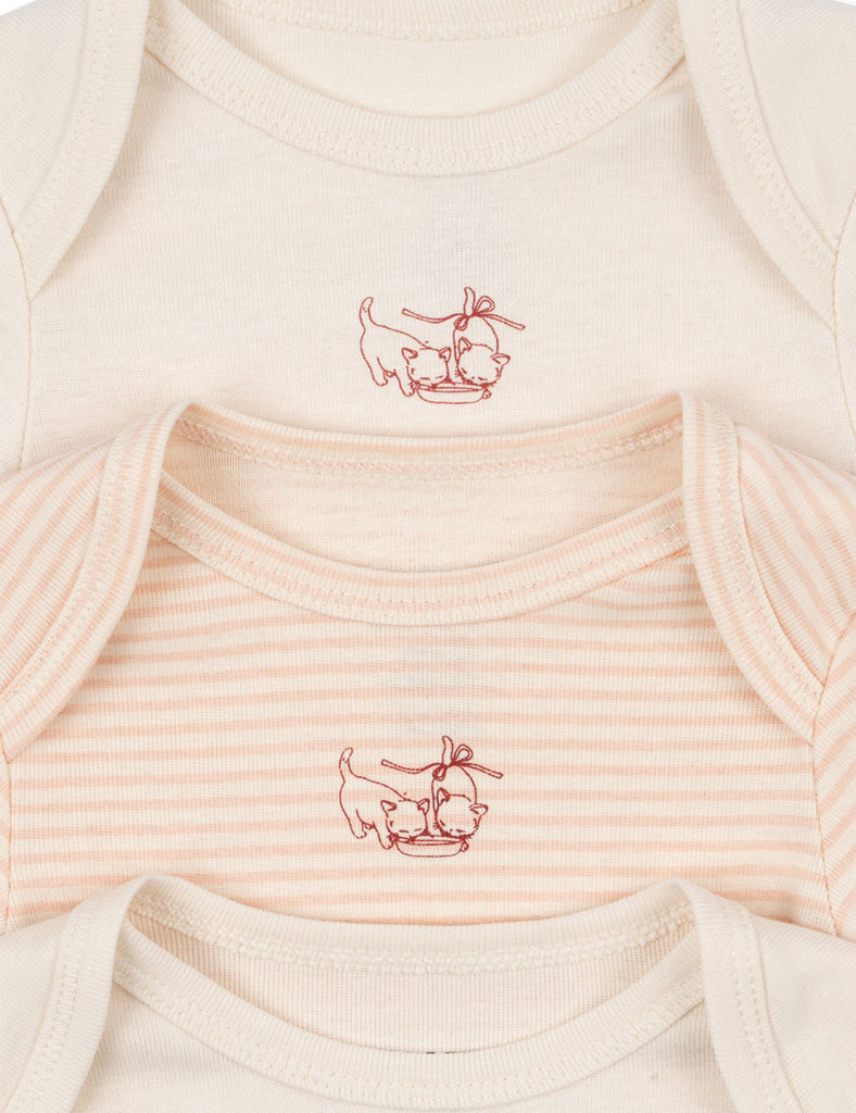 Three baby onesies with a kitty design on a white background