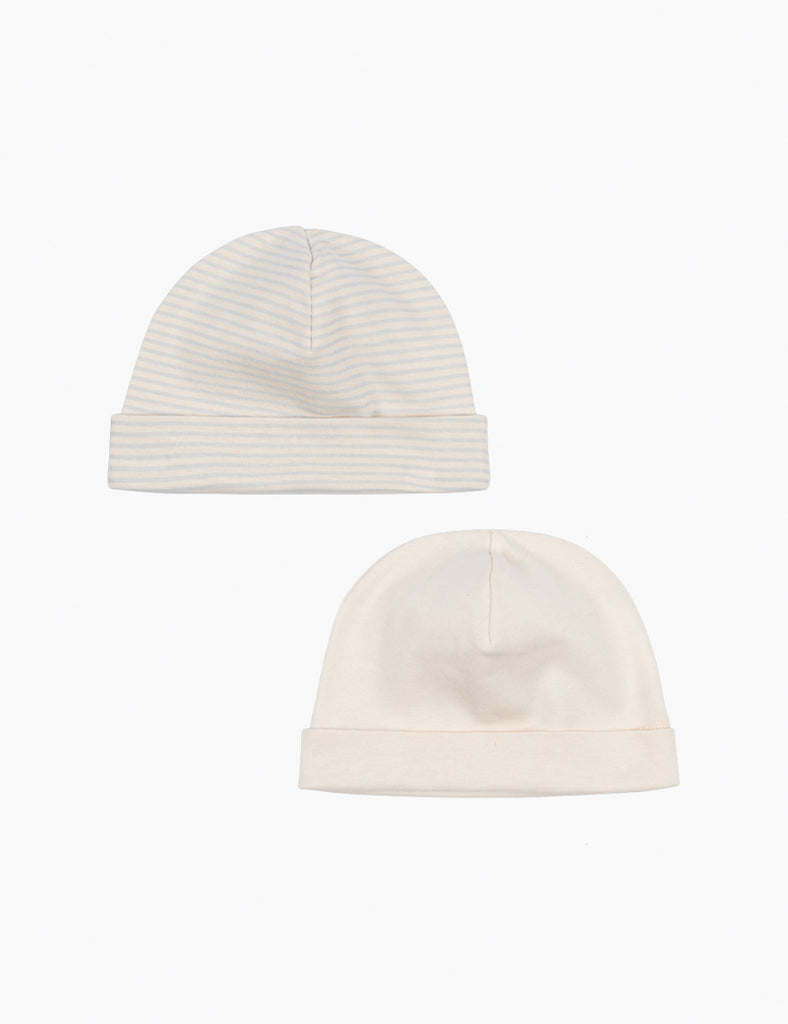 Two white beanies on a white background