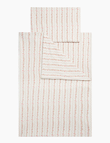 Childs floral stripe bedding and pillowcase on a white background