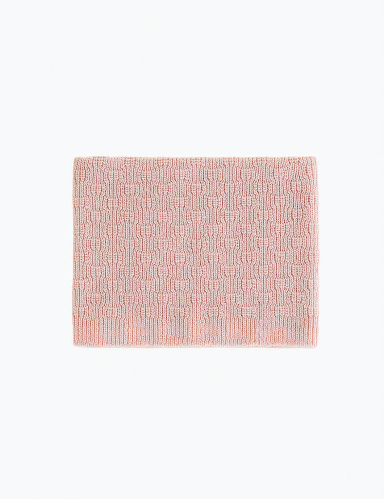Pink textured scarf on a white background