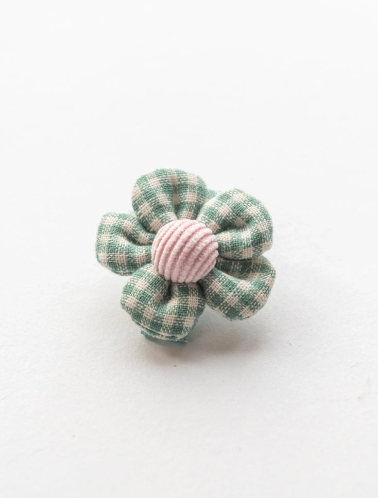 Gingham Flower Clip in Green flat lay image.