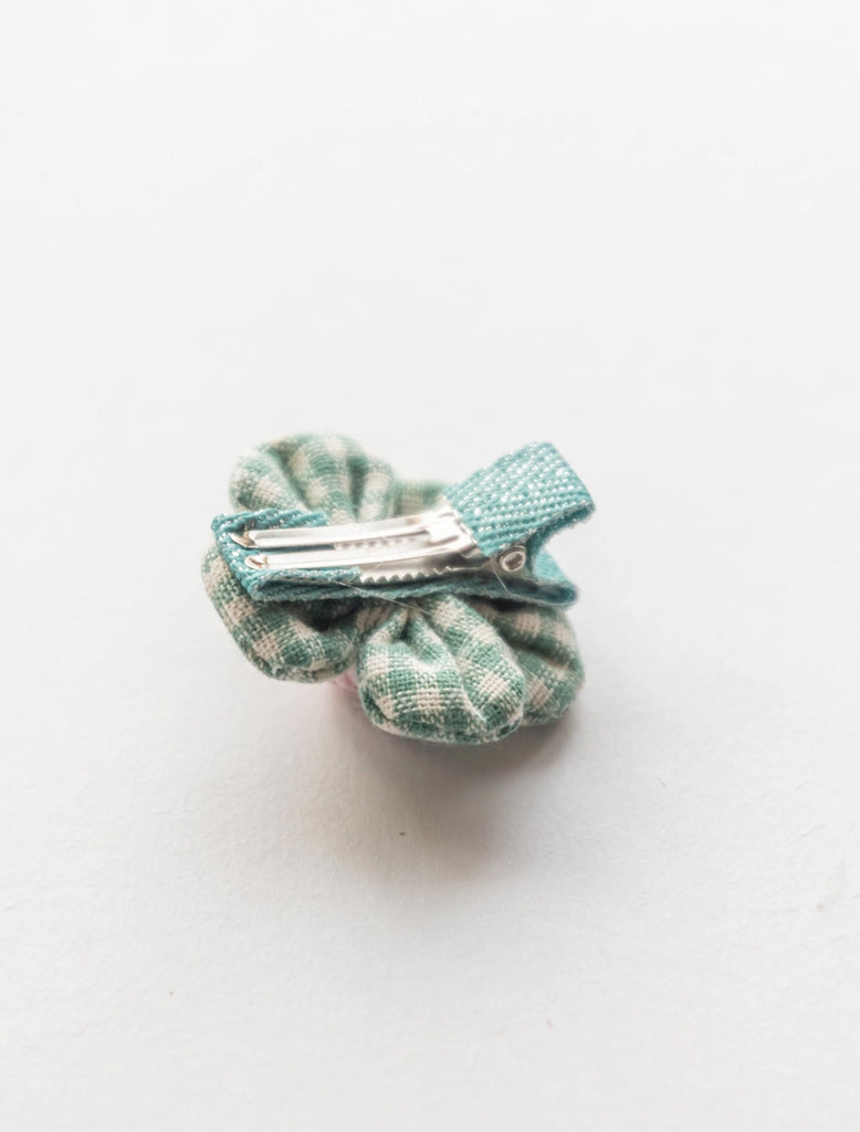 Gingham Flower Clip in Green flat lay image.
