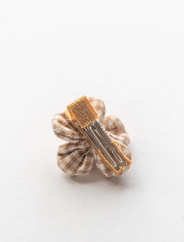 Gingham Flower Clip in Light Brown flat lay image.