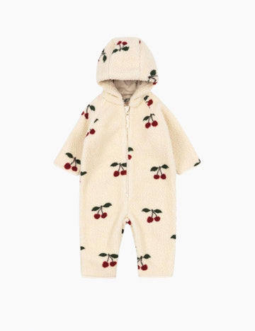 Cream-colored baby romper with cherry pattern on a white background