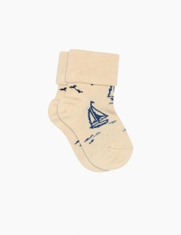 image of karl sock in sailboat