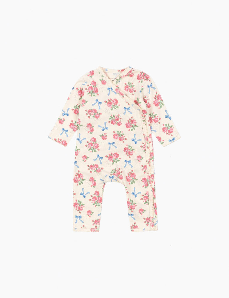 Floral baby romper on a white background