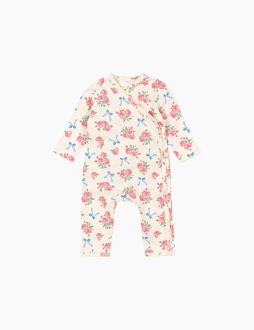 Floral baby romper on a white background