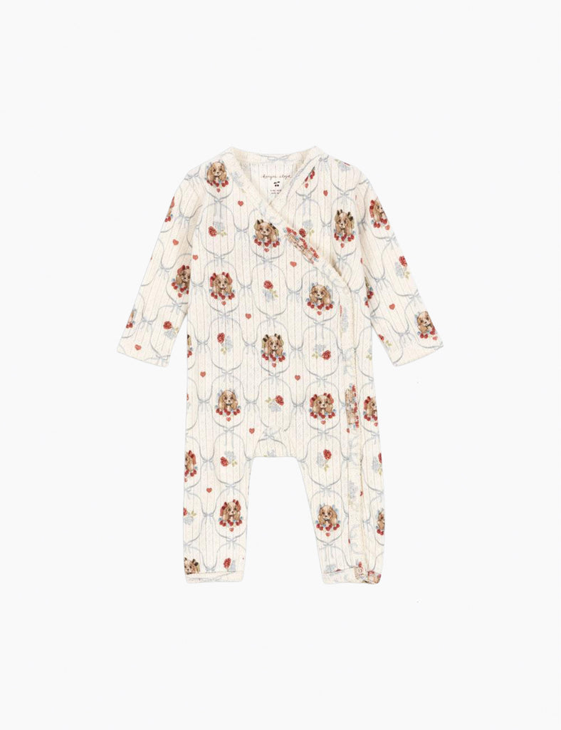 Puppy pattern baby onesie on a white background