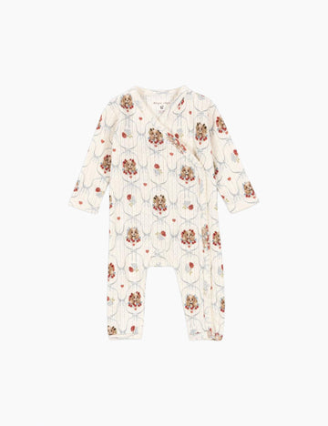 Puppy pattern baby onesie on a white background