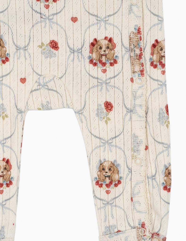 Close up of puppy pattern print on a white background