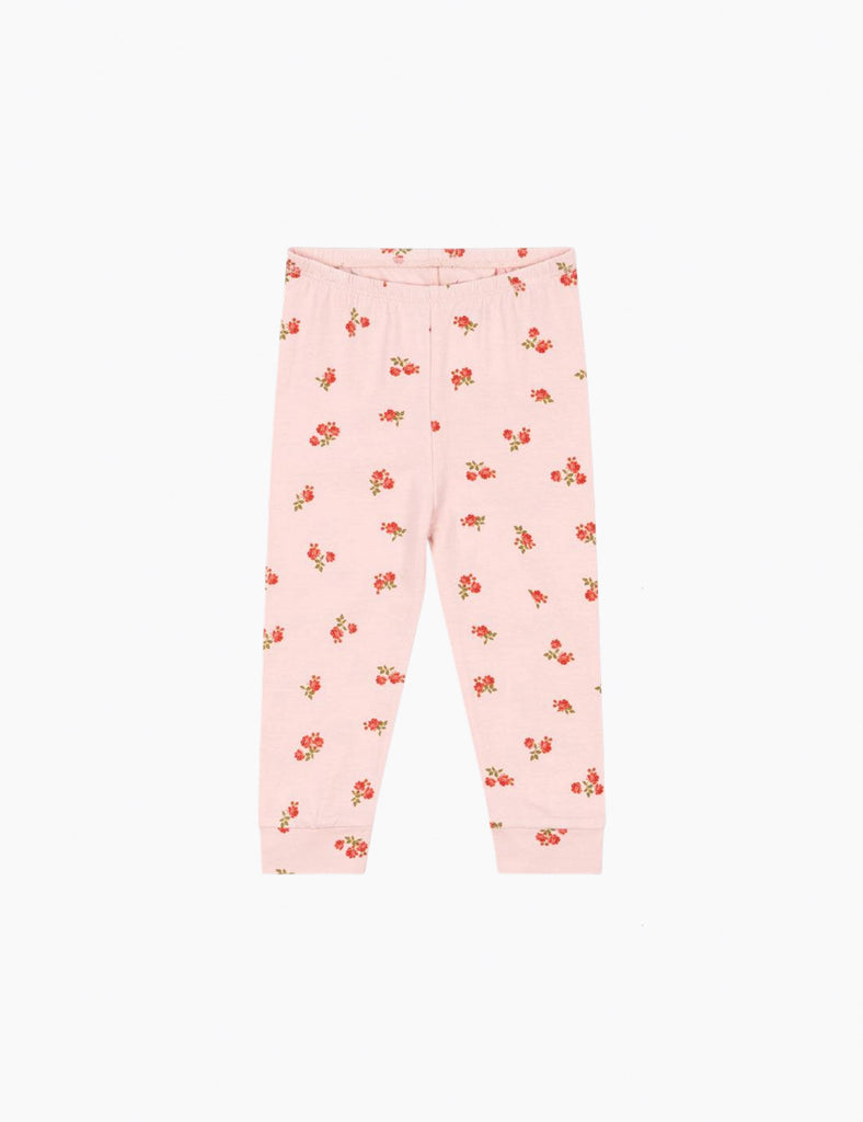 Pink children's leggings with floral pattern on a white background