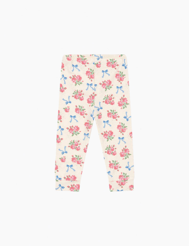 Leggings with floral and bow pattern on a white background