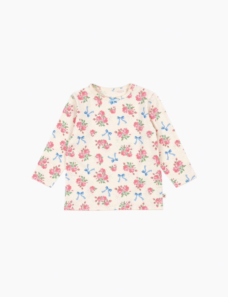 Floral top with bow pattern on a white background