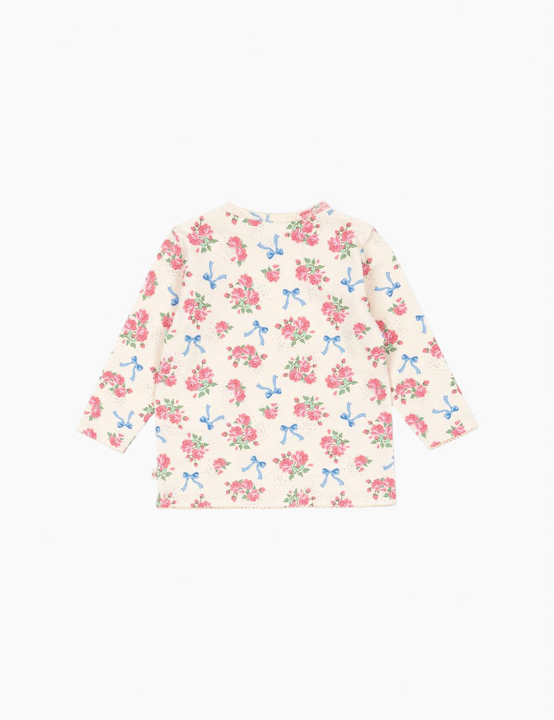 Floral patterned top on a white background