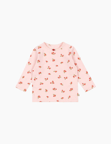 Pink long-sleeve shirt with floral pattern on a white background