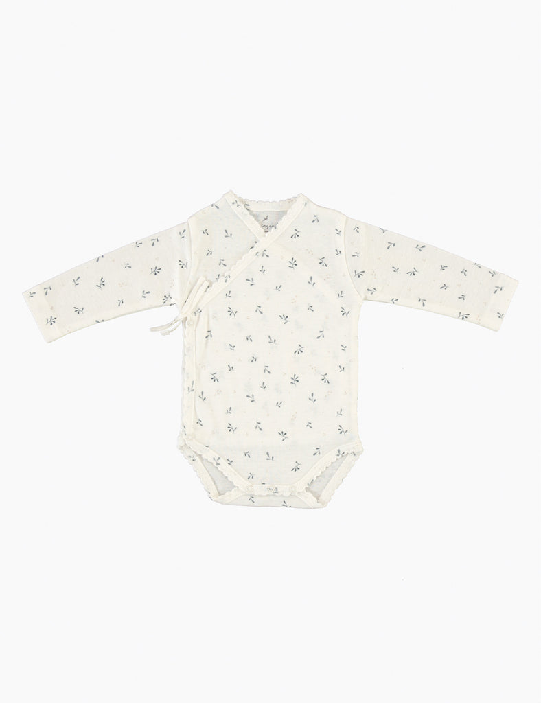 Baby onesie with a subtle pattern on a white background