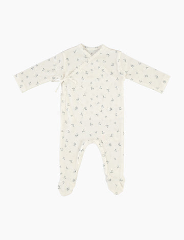 Baby onesie with a subtle pattern on a white background