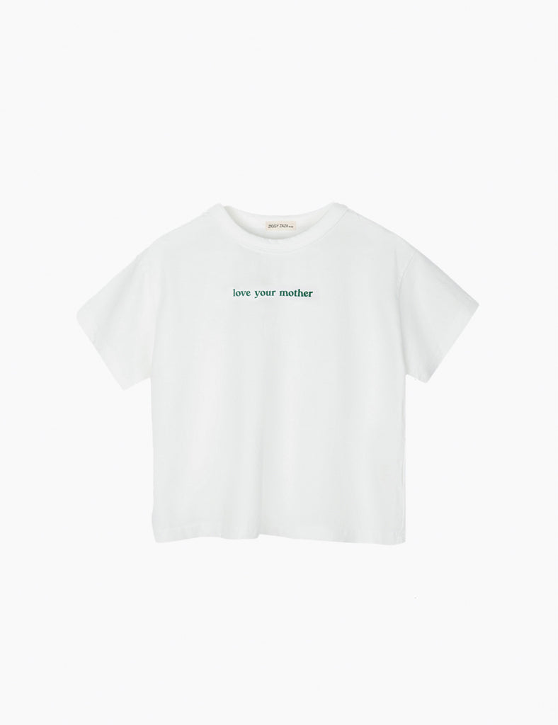 White t-shirt with 'love your mother' text on a white background