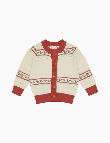 Knitted cardigan with red and white pattern on a white background