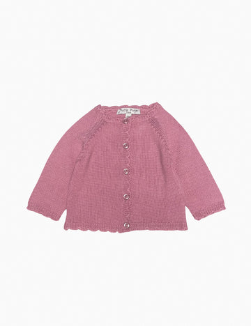 Pink knitted cardigan on a white background