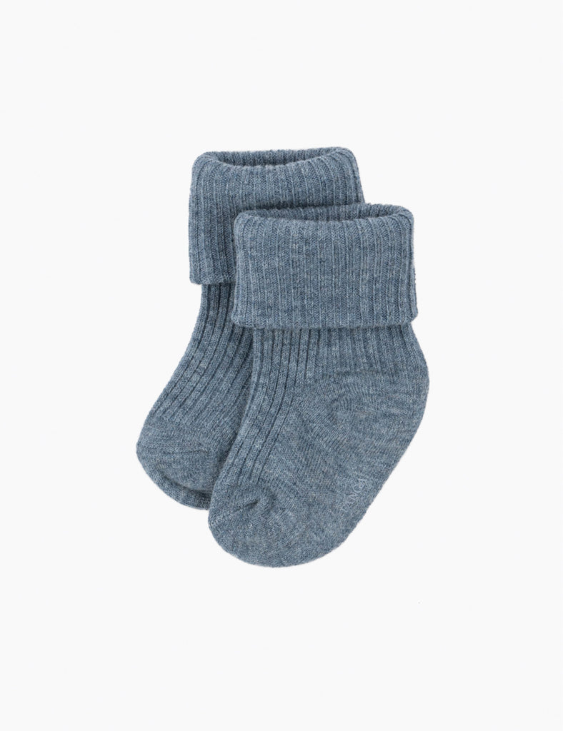 Pair of blue socks on a white background