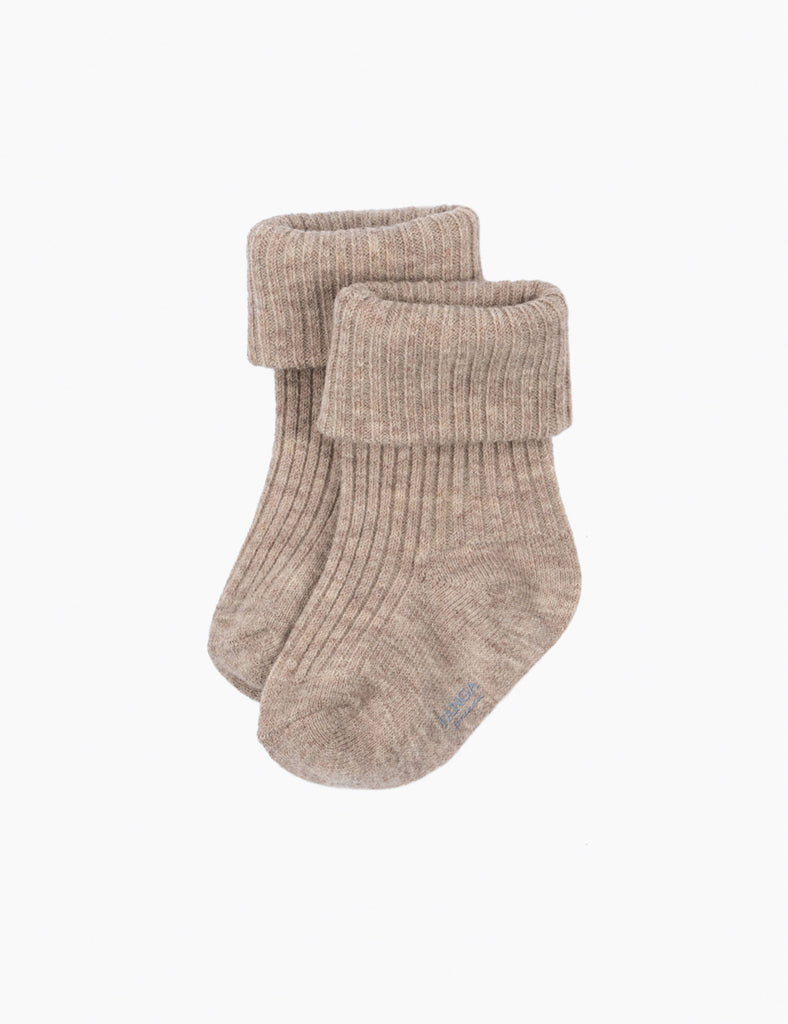 Pair of beige socks on a white background