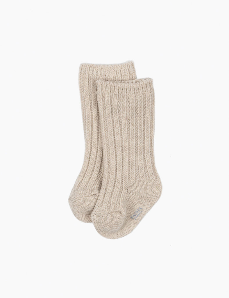 Pair of beige socks on a white background