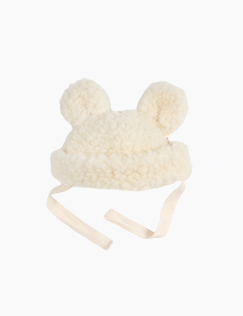 White fleece hat with ears on a white background