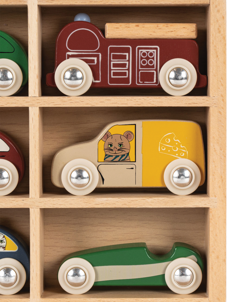 Collection of colorful wooden toy cars on a wooden shelf