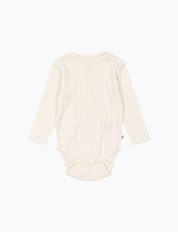 White baby bodysuit with long sleeves on a white background