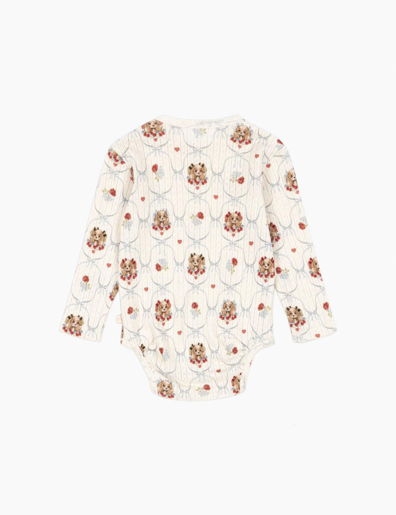 Floral patterned blouse on a white background