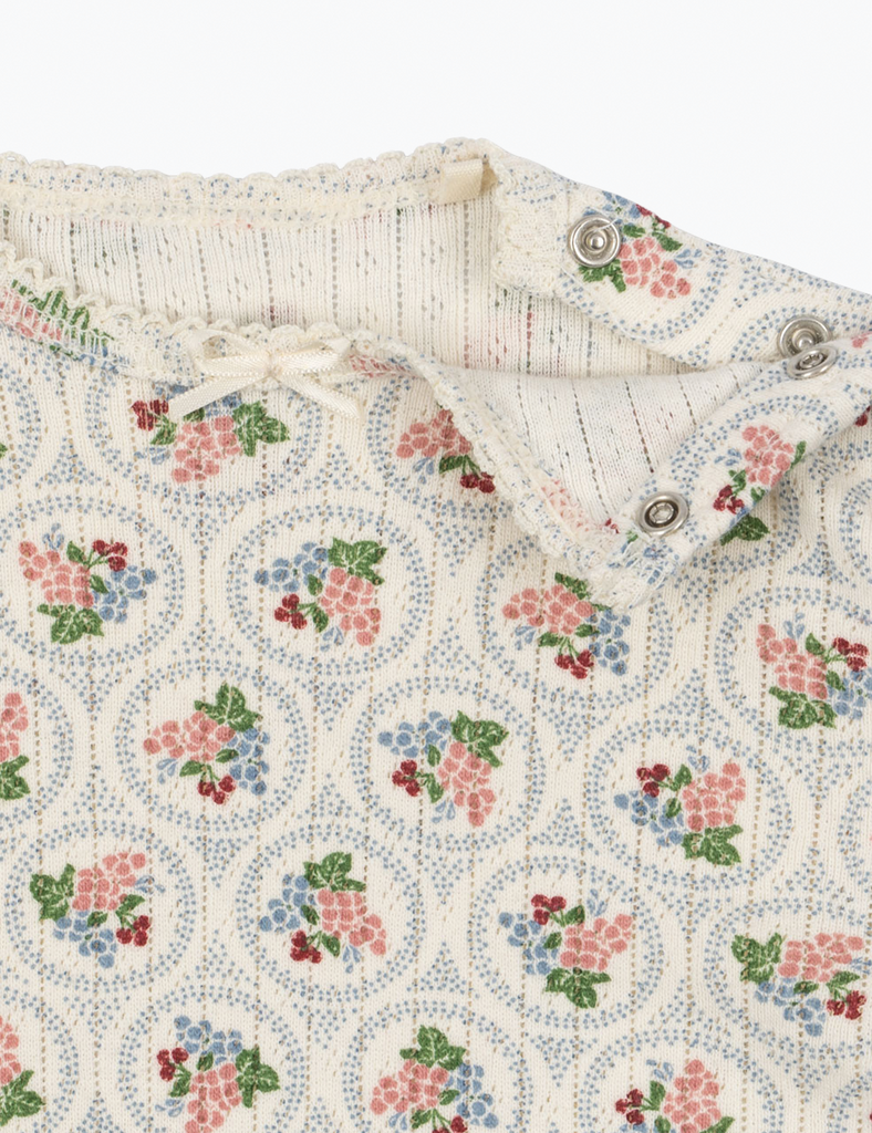 Floral patterned fabric with a white background
