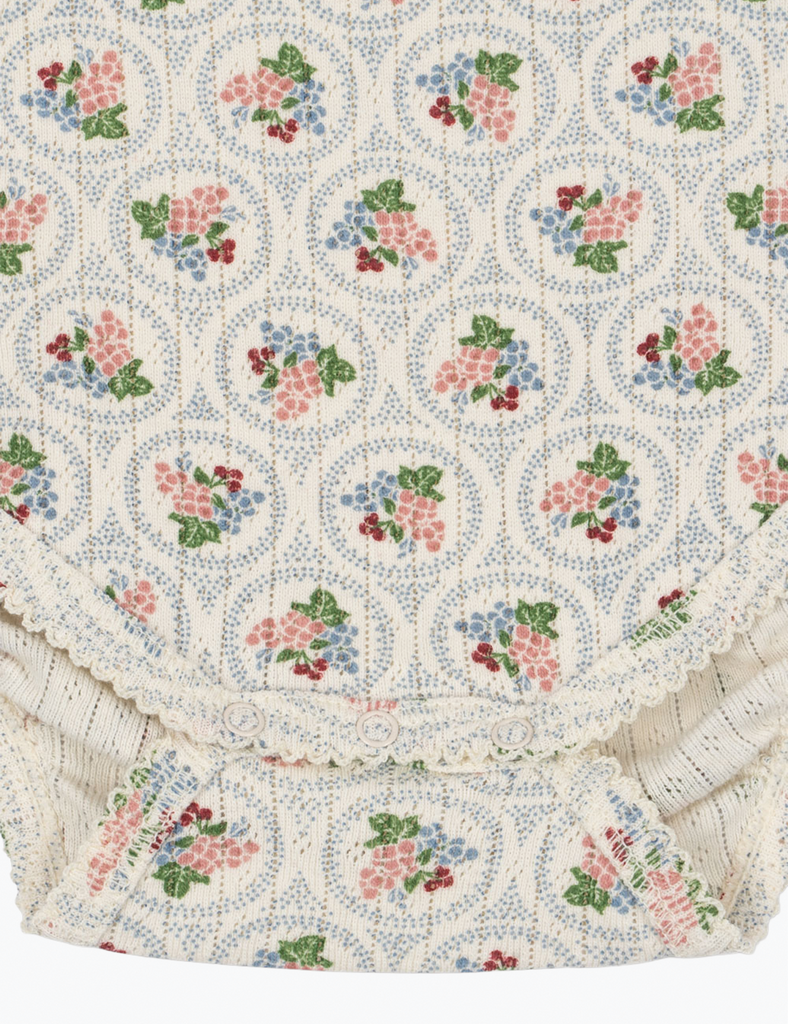Floral patterned fabric with a white background