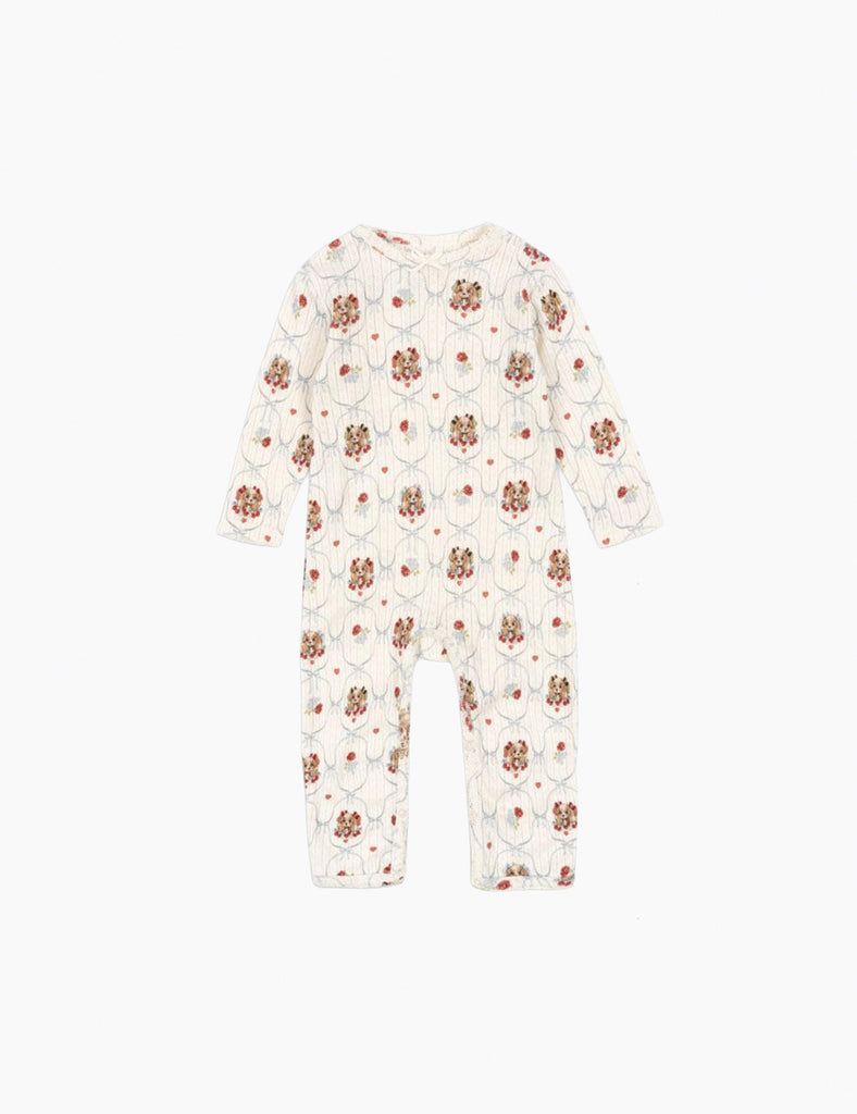 Puppy patterned baby onesie on a white background
