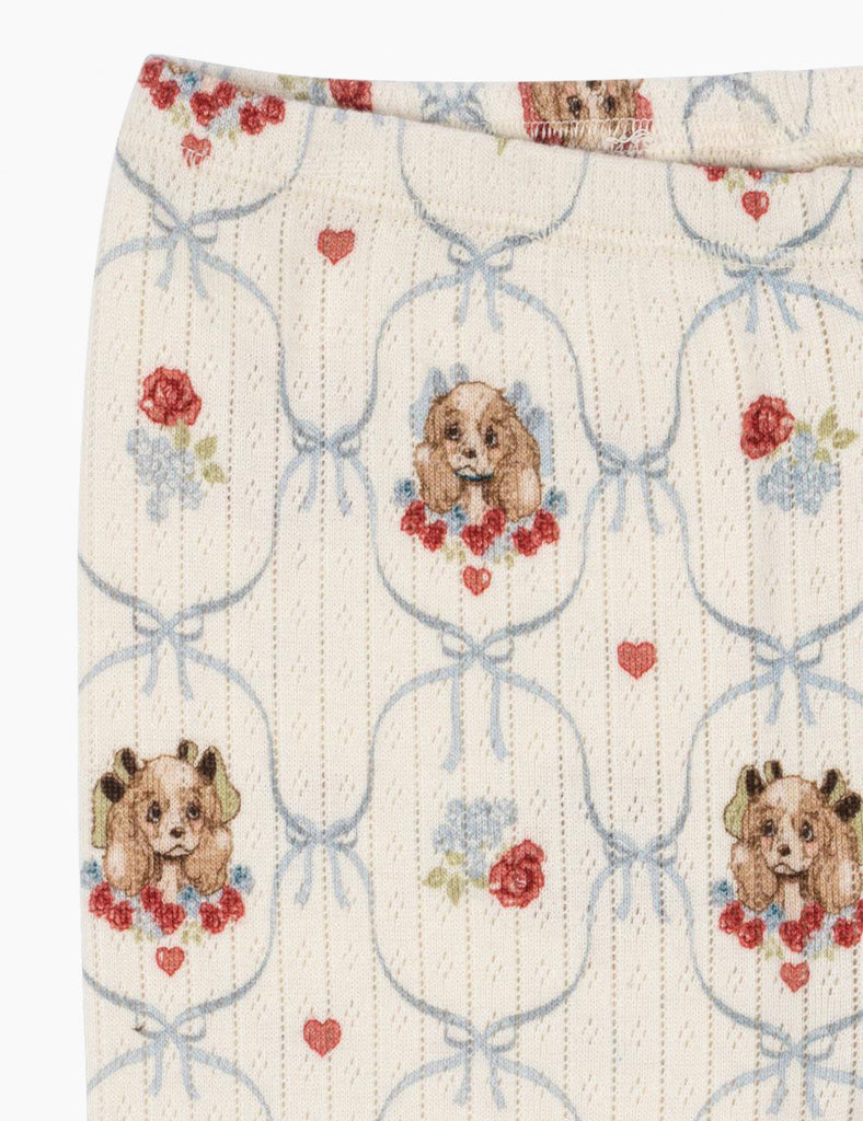 Puppy-patterned pants on a white background