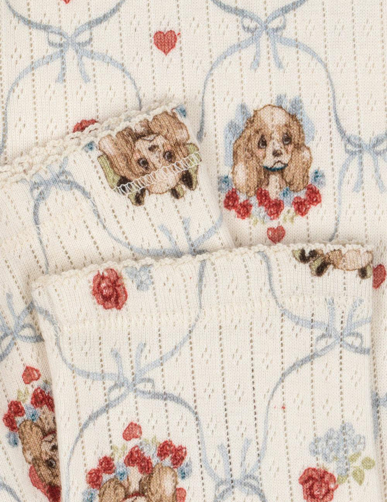 Puppy-patterned pants on a white background