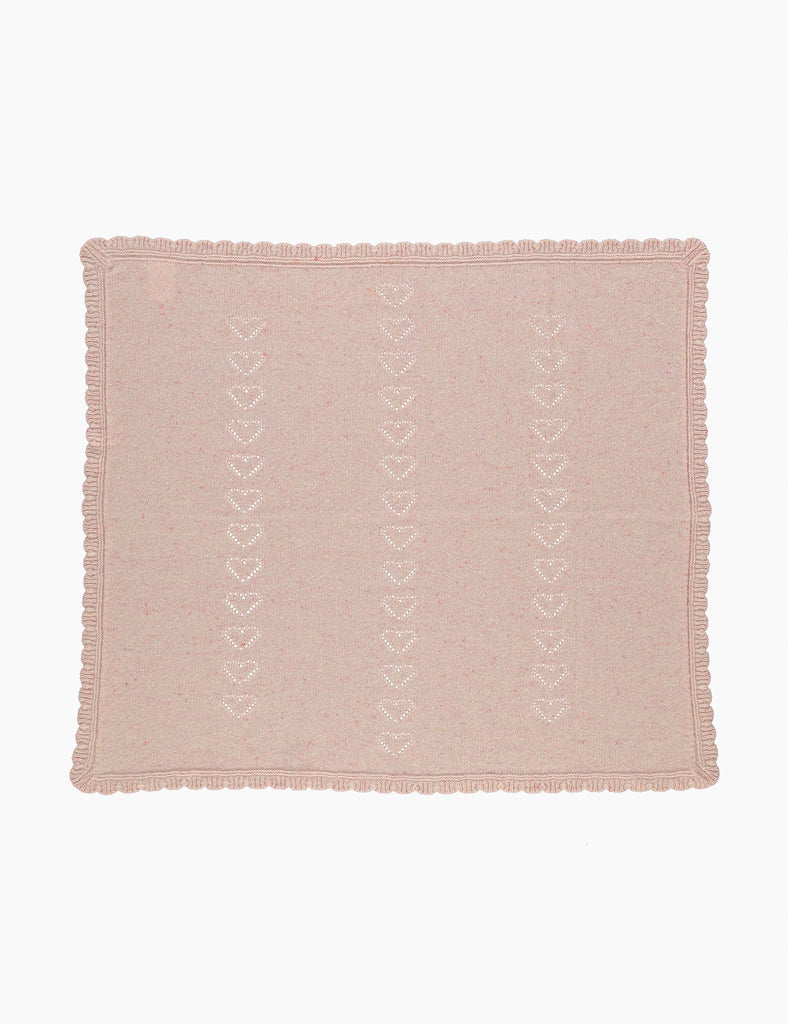 Pink textured fabric with heart pattern on a white background