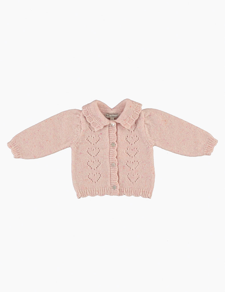 Pink baby cardigan with heart patterns on a white background