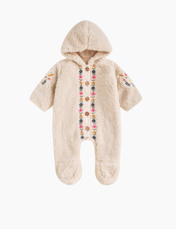 Beige baby snowsuit with colorful buttons on a white background