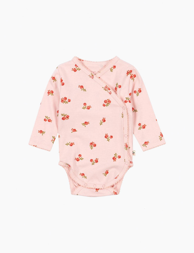 Pink baby bodysuit with floral pattern on a white background
