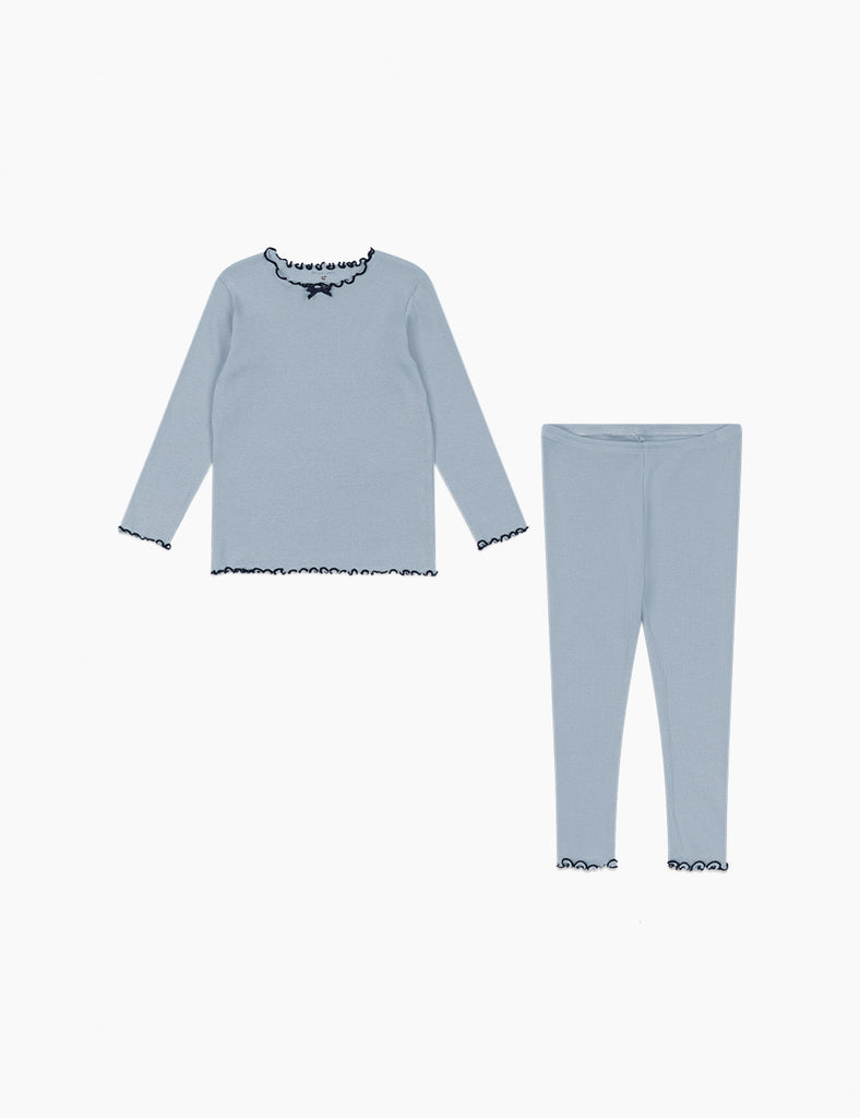 Light blue pajama set with lace trim on a white background